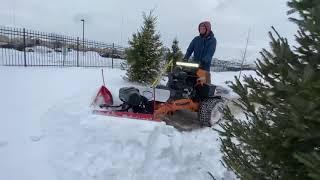 SCAG V Ride II with the BOSS ATV XT v-plow