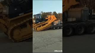 Watch a bulldozer climb onto the roof of a truck #shorts #shortvideo #short #song #video #viralvideo