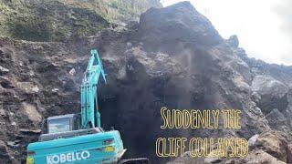 Sand mining||Cliff collapses as excavator digs sand mine