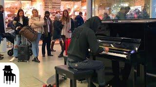 Skateboarder in hoodie amazes public with sublime piano music