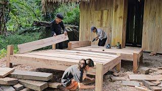 Homeless boy and the poor girl completed two wooden beds with their uncle