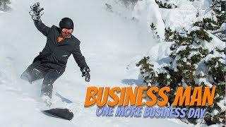 BUSINESSMAN POWDER SNOWBOARDING