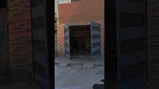 Automatismo motorline en portón batiente de estructura metálica #puertaautomatica