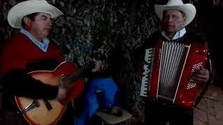 Roberto Soto y Juan López la niña