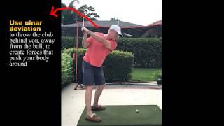 Use ulnar deviation to throw the club behind you