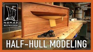 Carving a solid half-hull model of a 2.4mR sailboat