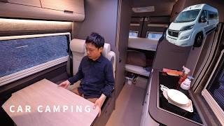 A deserted forest, drawn into the darkness. Car camping in a top-quality camper