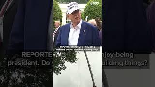 Trump celebrates installation of 2 flag poles at White House