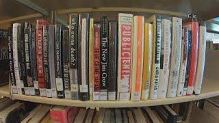 Fears drive Coeur d' Alene librarian to quit