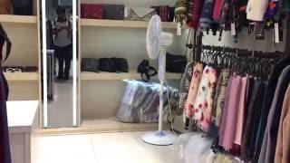 (Brands are unknown) Portable fans in a clothes store