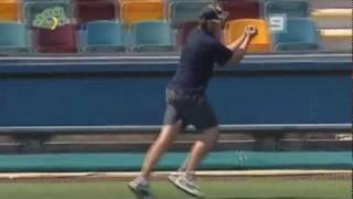 Screen-man takes a brilliant catch at the boundary