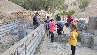 "Bekr family's cooperation in building a place for sheep"