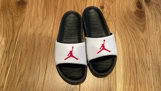 Jordan Break Slides in black, university red and white.