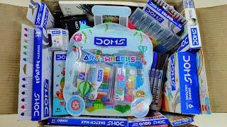 Box full of doms stationery items - art on wheels kit, colour pencils, wax crayons, clay, colour pen