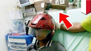 Helmet saves man from ax attack during daylight mugging in Indonesia - TomoNews