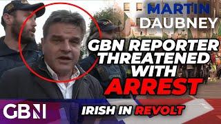 WATCH: GB News reporter threatened with ARREST at Irish protest against immigration IGNORED by media