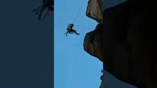 risky man collecting shilajit from mountain | shilajit is use to boost sexual power