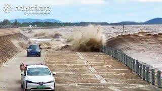 Huge Tidal Wave Chases Drivers In Crazy Footage