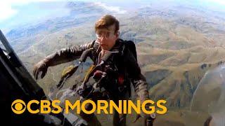 "Mission Impossible" helps Tom Cruise earn most burning parachute jumps Guinness World Record