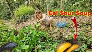 Lien Cooking sour eel soup, a rustic dish with a variety of vegetables