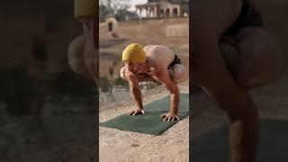 Advanced Yoga transition by the temple pond (the beanie is back)