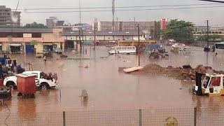 Choked gutter causes waste water an overflow on the main Gee-Kejetia Pampaso road in kumasi...