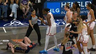 Caitlin Clark gets bumped to the ground for shoving Sheldon after hit in the face 