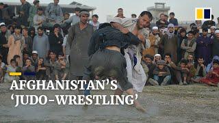 Afghan fighters throw down in ‘judo-wrestling’ matches in dusty Kabul field