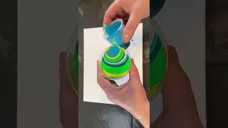 Watch the Colors Swirl and Blend in this mesmerizing acrylic pour painting.