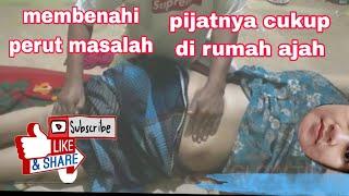 pijat perut wanita di rumah