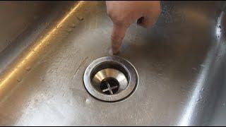 How to fix Standing puddle in kitchen sink