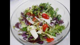 Healthy and delicious Salad with lettuce, cherry tomato and cheese.