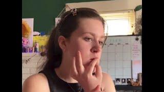 woman picking and biting nails