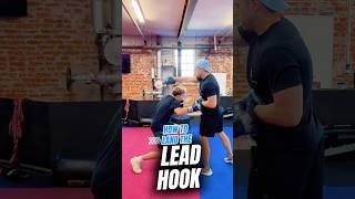 Most fighters miss this easy setup. Land your hook clean by forcing the guard to drop first.