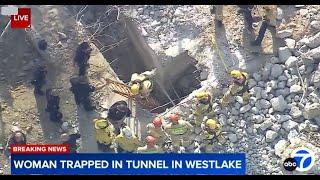 Firefighters rescue woman trapped in tunnel in Westlake