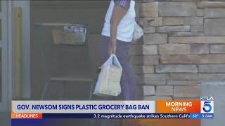 California Gov. Gavin Newsom signs new plastic grocery bag ban