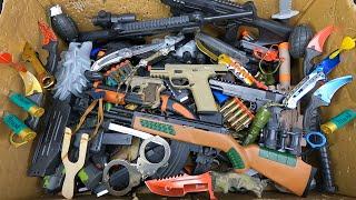 Airsoft Alpha BLE-001 Guns, Toy Combat Weapons, Lion Head Uzi, Karambit Knives And American Knives