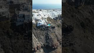 Santorini cliffs drone flight