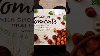 ROSHEN Moments milk chocolate pralines with whole hazelnuts.Bomboane de ciocolata cu alune de padure