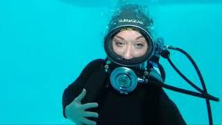 Female Diver is Diving with Vintage Rubber Smooth Skin Wetsuit in Pool