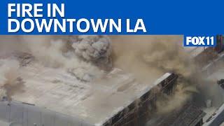 LIVE: Crews battle massive building fire in downtown LA