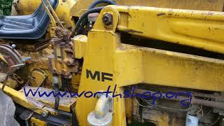 Mf30 backhoe first hydraulic line replaced and getting rid of roots after stump removal