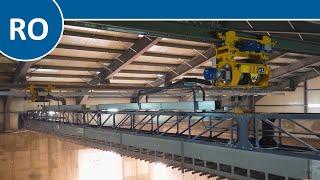 Metalmont Robot for the automatic handling of soybean meal in flat storage warehouses