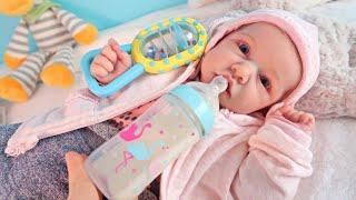 Reborn baby doll feeding and changing clothes and diapers Zyriki TV