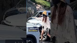 Angry woman assaults car driver after failing to cut into lane #shorts