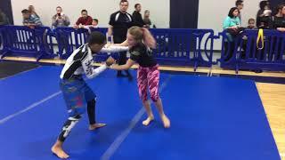 BJJ Girl Wins With Armbar vs Boy in No Gi Match