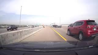 Lug Nuts Fly At Car After Tire Comes Loose Off Truck on Road - 1144809