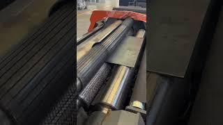 Sheet metal forming process using a roll forming machine