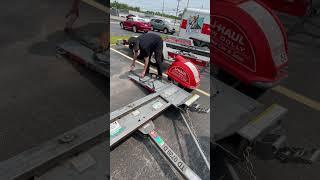 UHaul staff explains how to use Tow Dolly for towing cars 