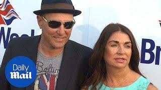 Vinnie Jones poses for press photographers with his wife - Daily Mail